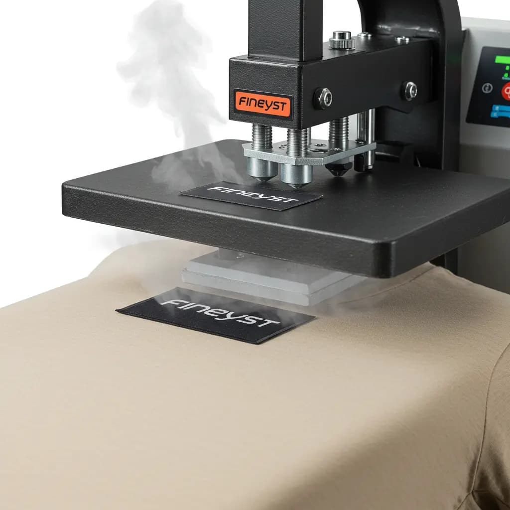 Heat press machine applying a colorful embroidered patch